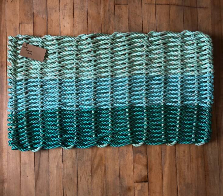 Washashore uses nautical rope that has either been found washed ashore or retired from ocean farming and donated. Their Custom Rope Mats allow you to choose the size and colors; from $50.