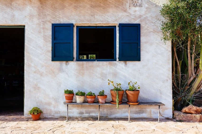 Reuse architecture island vacation house created from garden center menorca spain