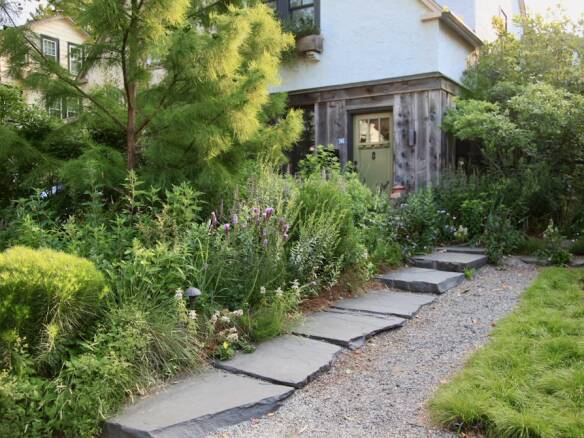 https://www.gardenista.com/wp-content/uploads/2023/11/refugia-stormwater-management-4-584x438.jpg?ezimgfmt=ng%3Awebp%2Fngcb8%2Frs%3Adevice%2Frscb9-2