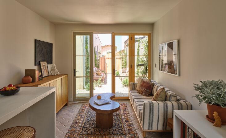 A one-car garage becomes a functional one-bedroom ADU. Photograph by Michael P.H. Clifford, courtesy of Allprace (@allprace); styling by @EthanKotch and @A\1000XBetter; from Formerly a Garage: A 400-Square-Foot One-Bedroom House in LA.