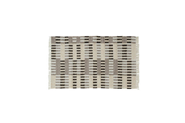 The Kiel Indoor/Outdoor Rug is \$\179 for the 3-by-5-foot size at Rejuvenation.