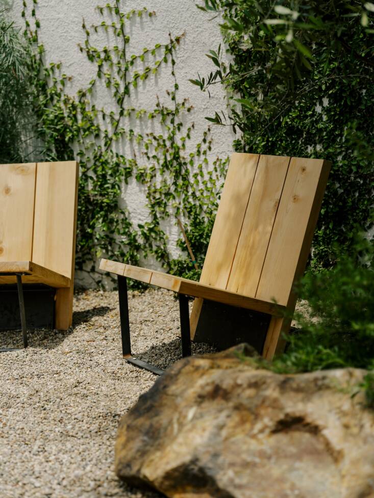 One corner sees a group of ORCA Adirondack Chairs in Steel (Rust) waiting for a future fire pit Stephanie and Daniel plan to add one day. Photograph by Austin John for Finca Glenfeliz.