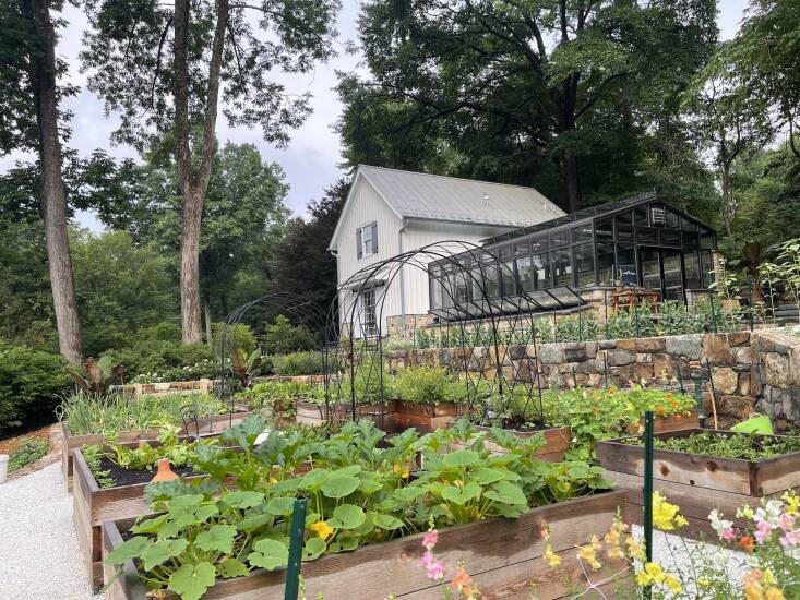 In Giving Garden South, Logan grows cut and edible flowers, vegetables, and fruit trees including figs and cherries. The yield is grown in beds built using Hügelkulture methods (raised beds constructed with decaying wood and other compostable biomass).