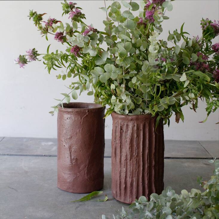 You can choose between horizontal, vertical, or natural texture, as well as one of seven colors (pictured is Brick). All Vases hold water for fresh flowers; \$\190.