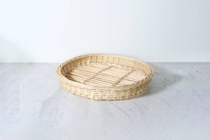 Woven in Fayl-Billot, France, the French Round Wicker Tray is \$6\1.50 at Flotsom and Fork.