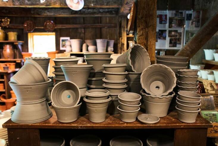 Ben Wolff’s grey clay pots on display. 