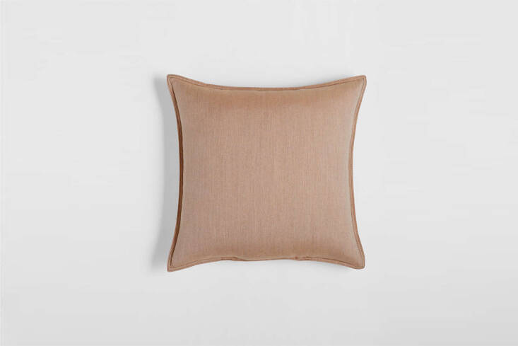 The Sunbrella Petal Pink Outdoor Pillow is \$\27.57 for the \20-by-\20-inch size at Crate & Barrel.