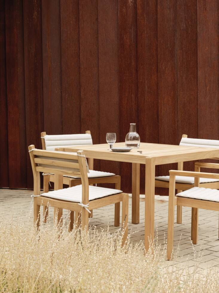 The dining table is also available in a larger, rectangular size.