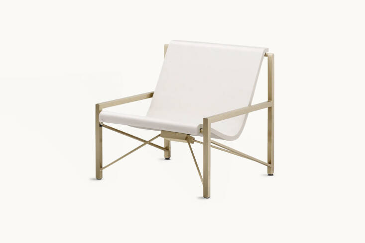 Another Galanter & Jones model, the Evia Chair shown in bone and brass is inspired by the leather sling chair but made in stone with a heating element; \$3,400.