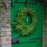 The Editors' Cut: 14 Winsome Ways to Decorate the Front Door for the Holidays