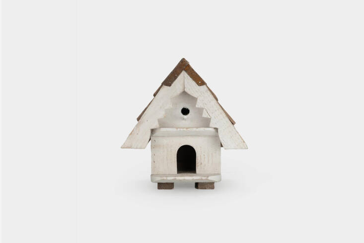 For overwintering small birds, including chickadees, finches, and sparrows, a sweet chalet-style cabin made from reclaimed pine. Shop here.