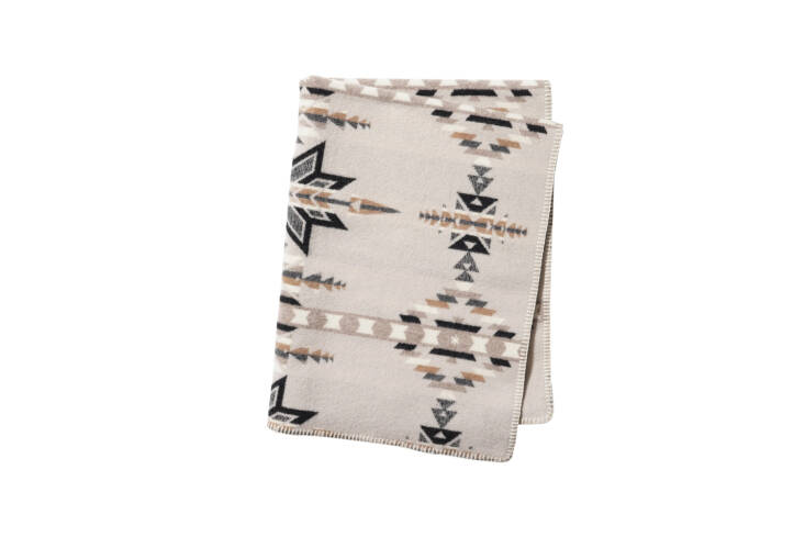 The Snow Peak x Pendleton Blanket is a riff on the classic Pendleton multifunctional accessory for the tent, by the campfire, or at home; \$\299.95 at Snow Peak.