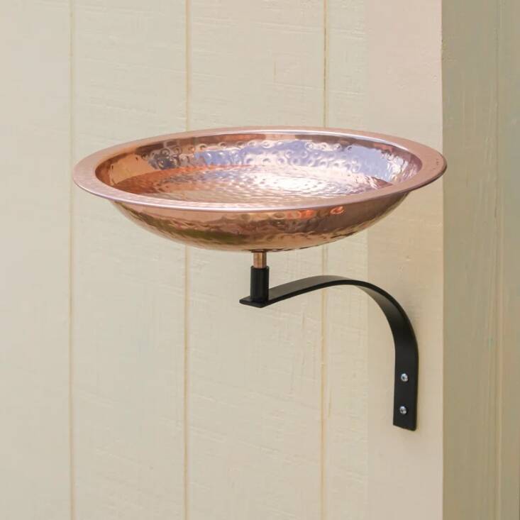 The 5-star reviewed Hammered Copper Birdbath can be mounted to any surface and is a great addition to porches and decks.